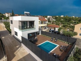 Luxury villa with private heated pool and sea view, only 100m from the beach