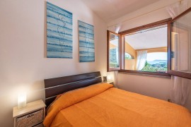 Casa vacanze 'Domixedda' con vista mare, terrazza privata e aria condizionata