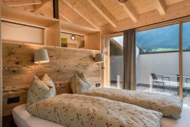 Appartamento Reguz con vista sulle montagne, giardino, terrazza, sauna e Wi-Fi